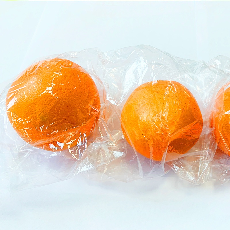 新款全自动水果保鲜膜单果套袋机 橙子柠檬水果包装机